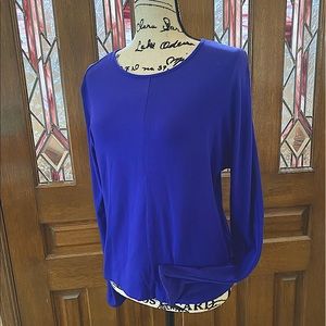 DANA BUCKMAN DOLMAN SLEEVE TOP. SIZE L. DRY CLEAN OR GSND WASH COLD.